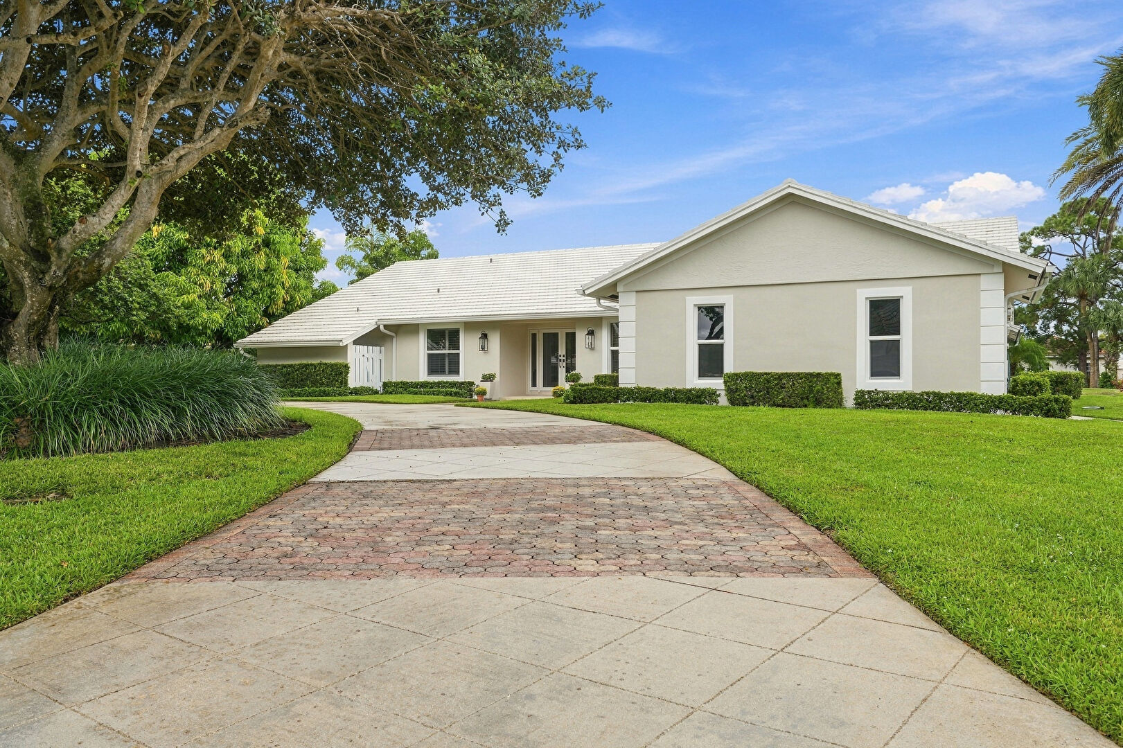 Front at 444 Glenbrook Drive, Atlantis, FL 33462, listed by Brian Woeller
