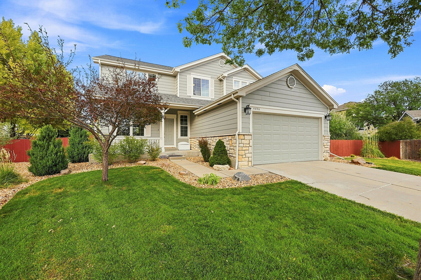 Front at 4896 South Himalaya Court, Aurora, CO 80015, listed by Tatyana Sturm