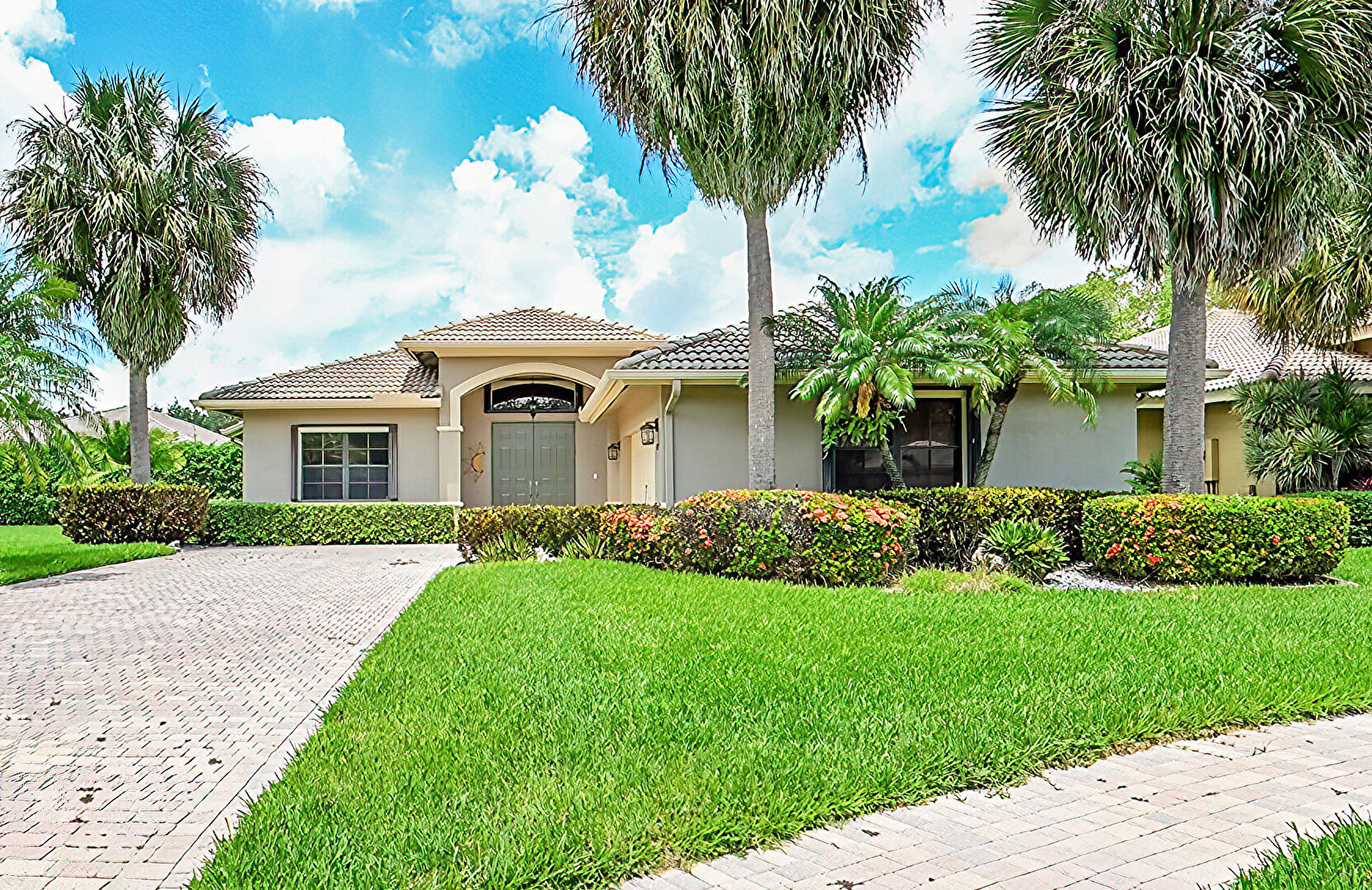 Front at 8046 Via Grande, Boynton Beach, FL 33437, listed by Laura Sanders
