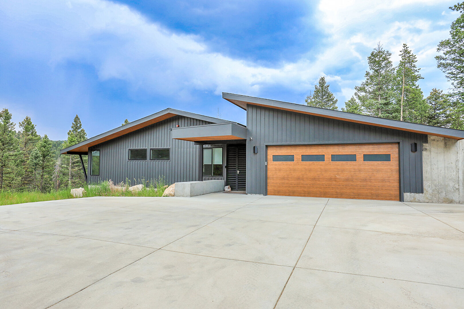 Front at 28128 Juniper Drive, Conifer, CO 80433, listed by K.C. Golfinopoulos