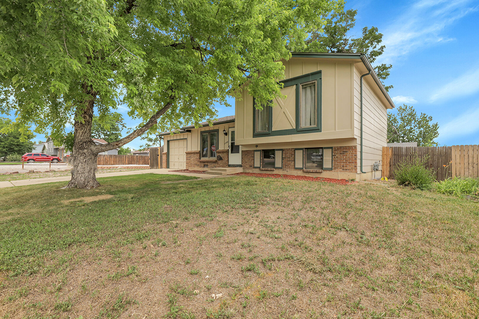 Front at 1398 Elmwood Street, Broomfield, CO 80020, listed by Debra Graves