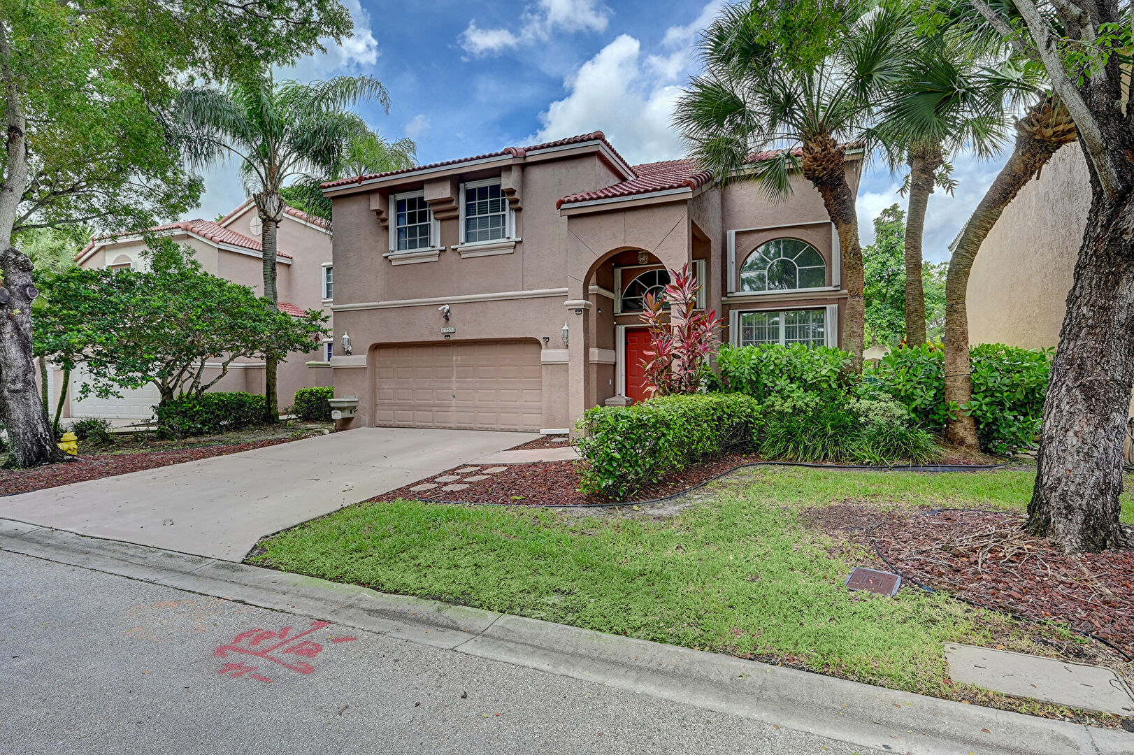 Front at 5532 Northwest 106th Drive, Coral Springs, FL 33076, listed by Anthony Nastase