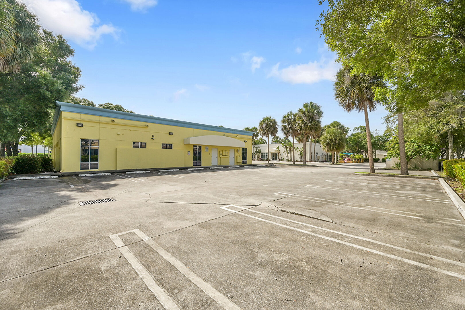 Property Exterior at 5201 Village Boulevard, West Palm Beach, FL 33407, listed by Rafael Carrero