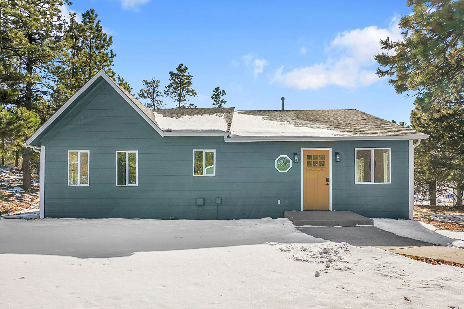 Front at 6545 Burgess Road, Colorado Springs, CO 80908, listed by Terry Moss