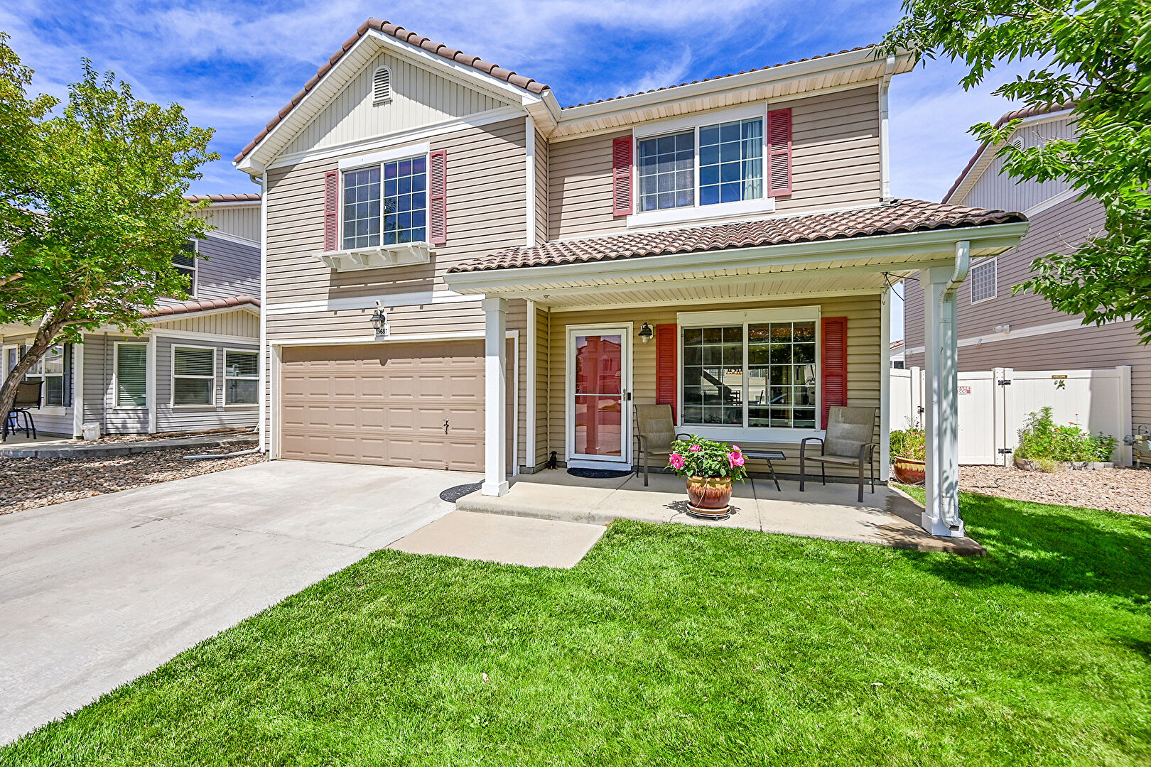 Front at 19687 50th Avenue, Denver, CO 80249, listed by Will Story