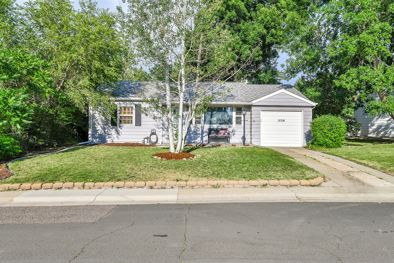 Front at 5136 S Pennsylvania Street, Littleton, CO 80121, listed by Danna Clark, MLS ID: 1528096