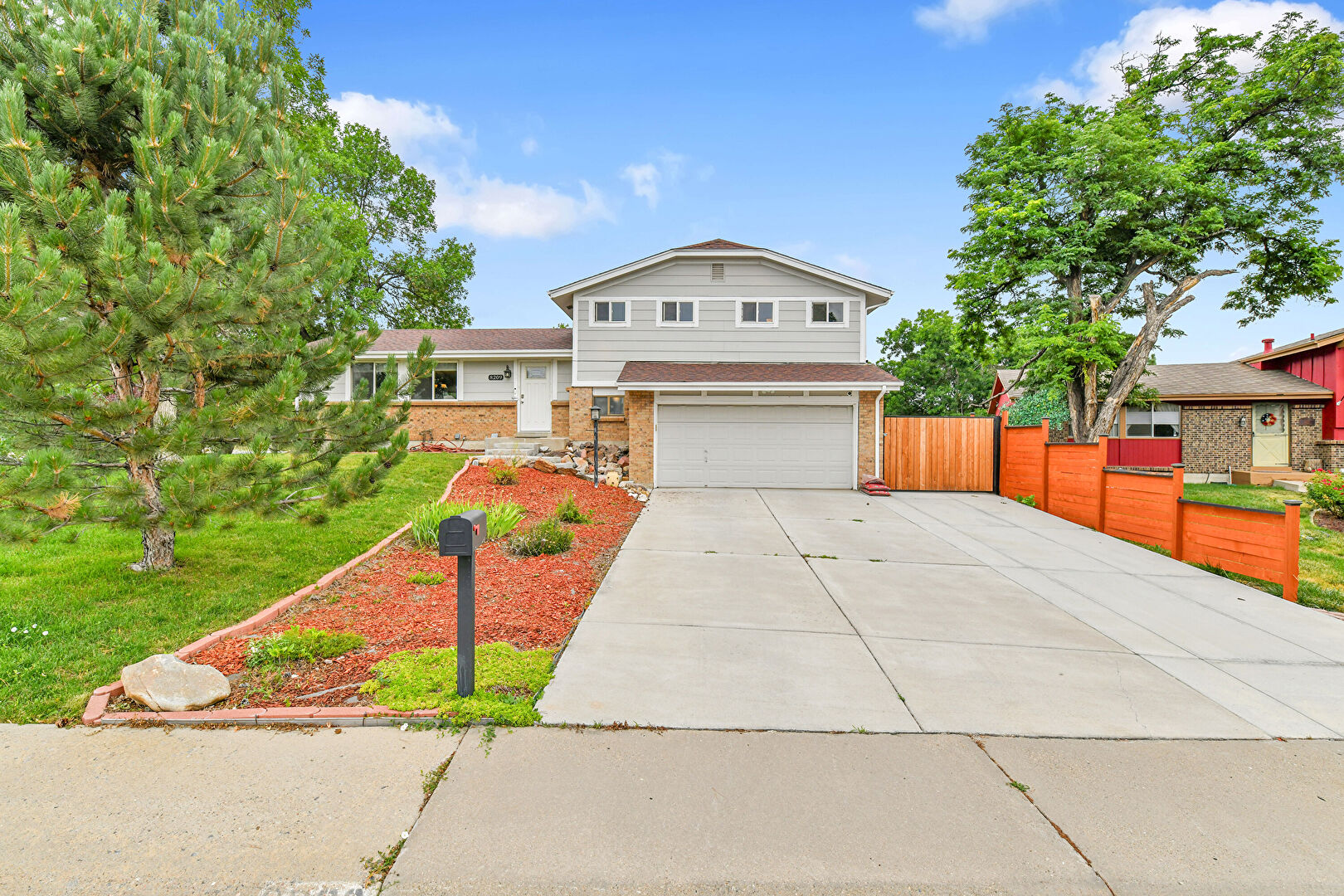 Front at 8209 Balsam Way, Arvada, CO 80005, listed by Luxe Home Group