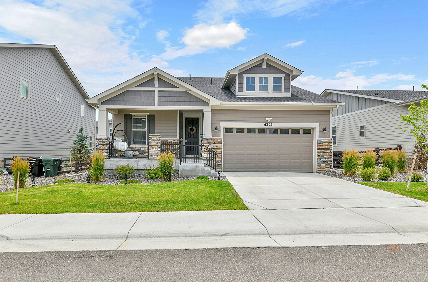 Front at 6302 E 142nd Pl, Thornton, CO 80602, listed by Jenna and Patrick McMenaman