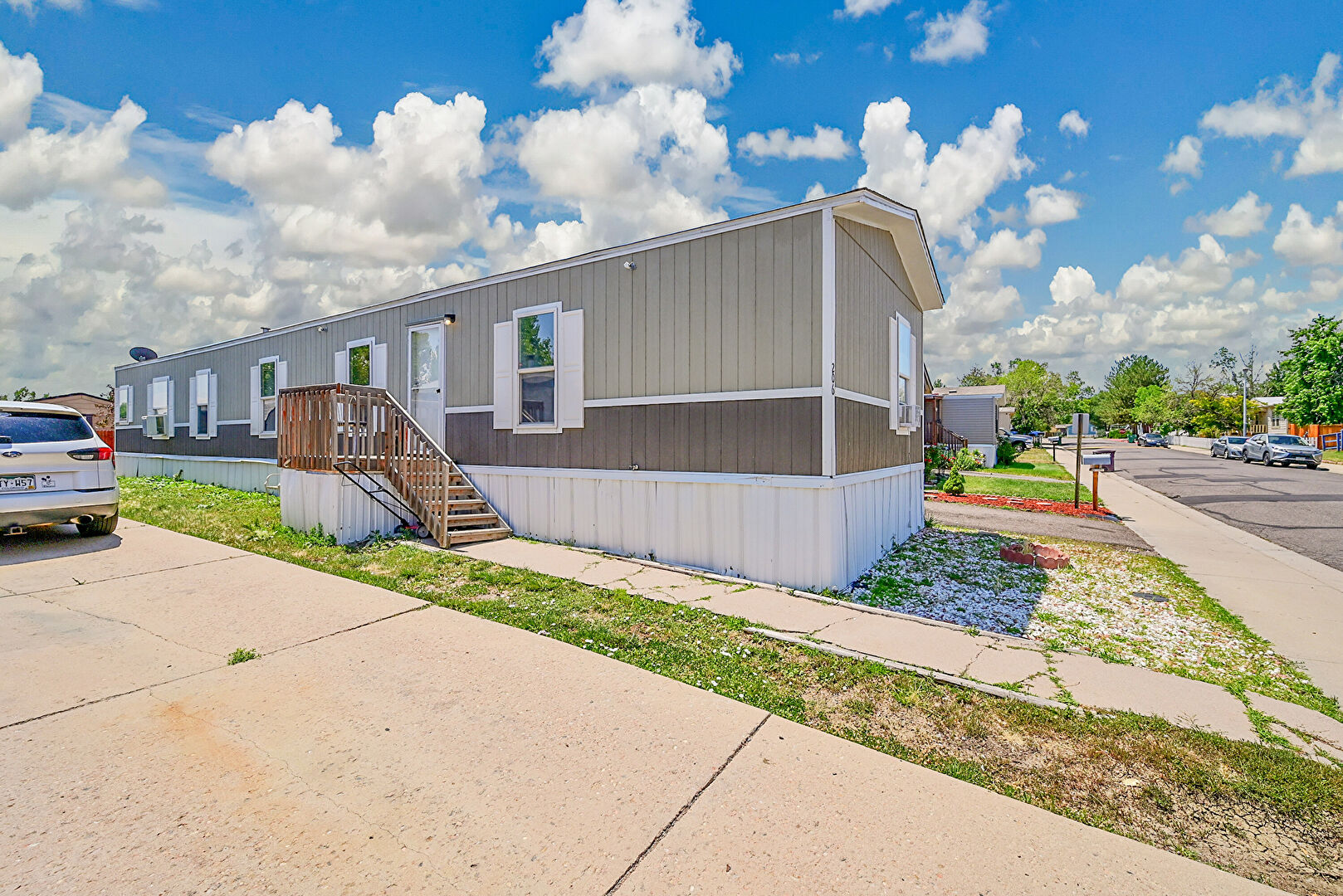 Front at 5064 East 97th Place, Denver, CO 80229, listed by Cynthia Padilla