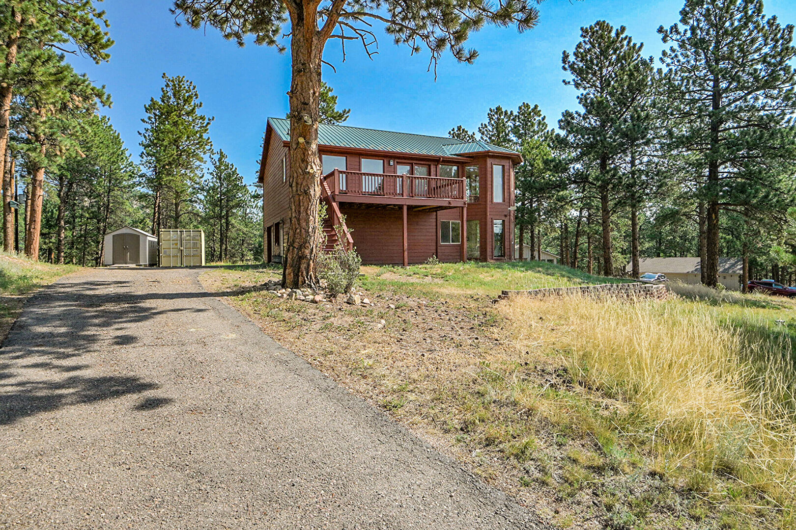 Front at 303 Kudu Trail, Bailey, CO 80421, listed by Jenny Penman