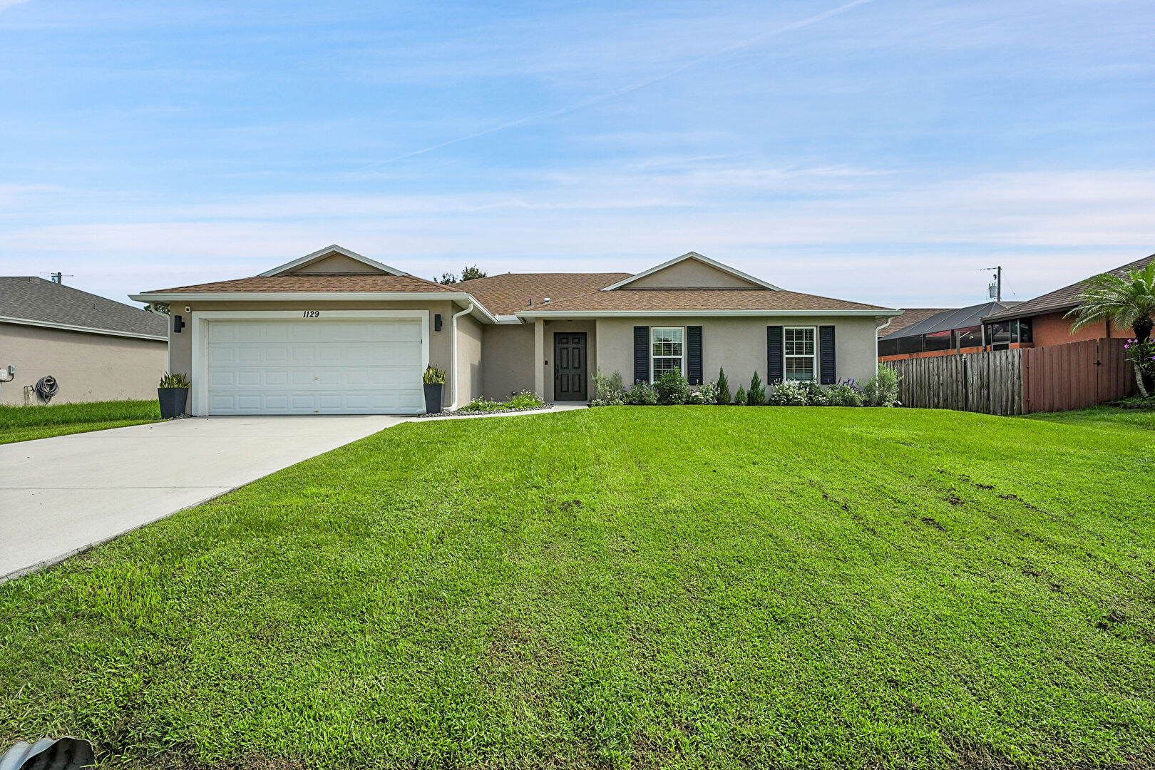 Front at 1129 Southwest Arc Court, Port St. Lucie, FL 34953, listed by Laura Sanders, MLS ID: F10514772