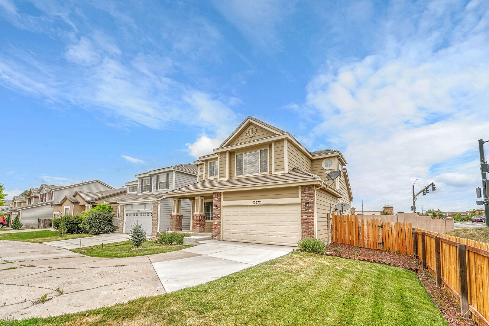 Front at 12372 South Nate Circle, Parker, CO 80134, listed by Debra Lopez