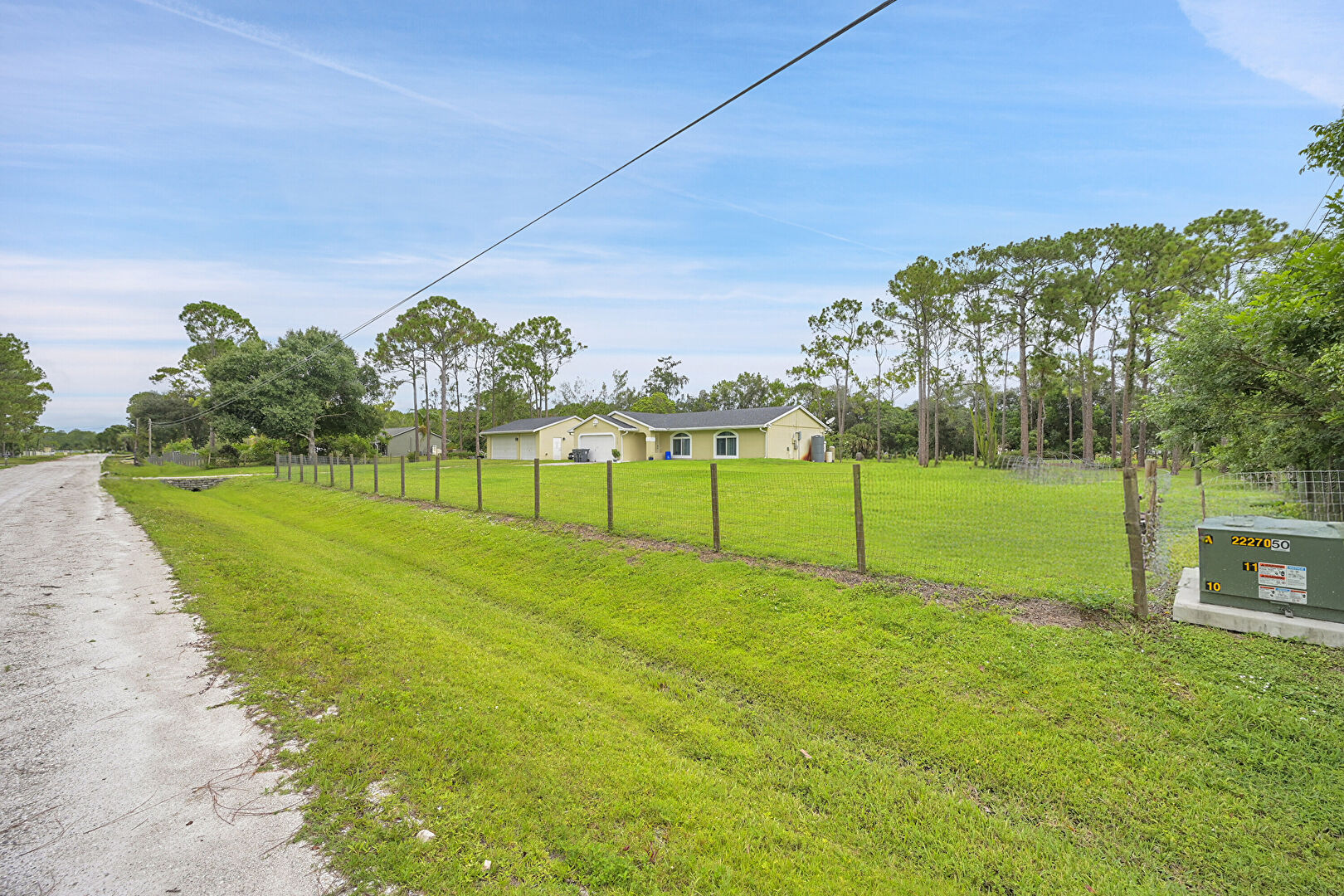 Front yard at 14767 66th St, Loxahatchee, FL 33470, listed by Monica Garrido, MLS ID: F10509940