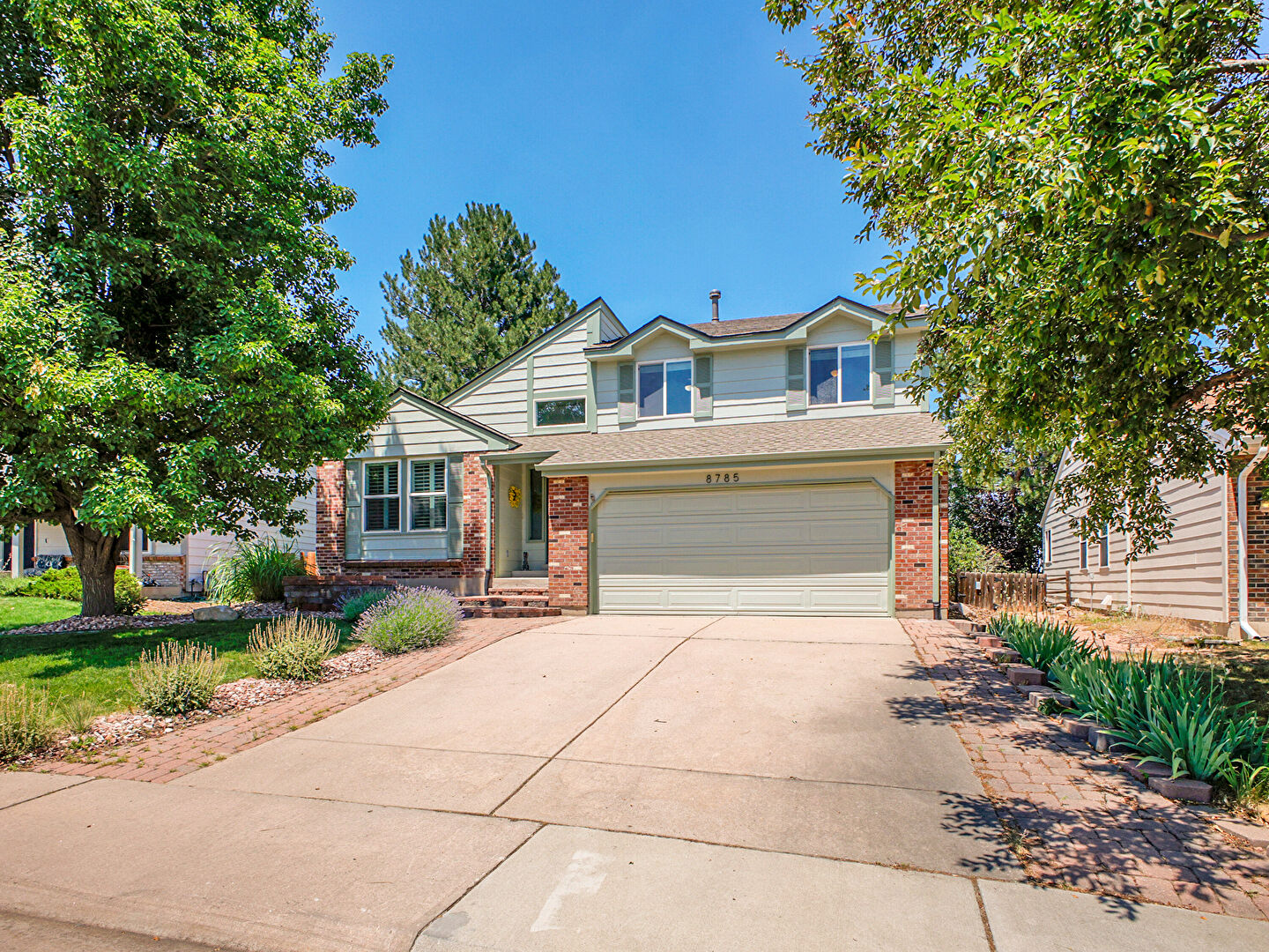 Front at 8785 w quarto circle, Littleton, CO 80128, listed by Lauren Weiss