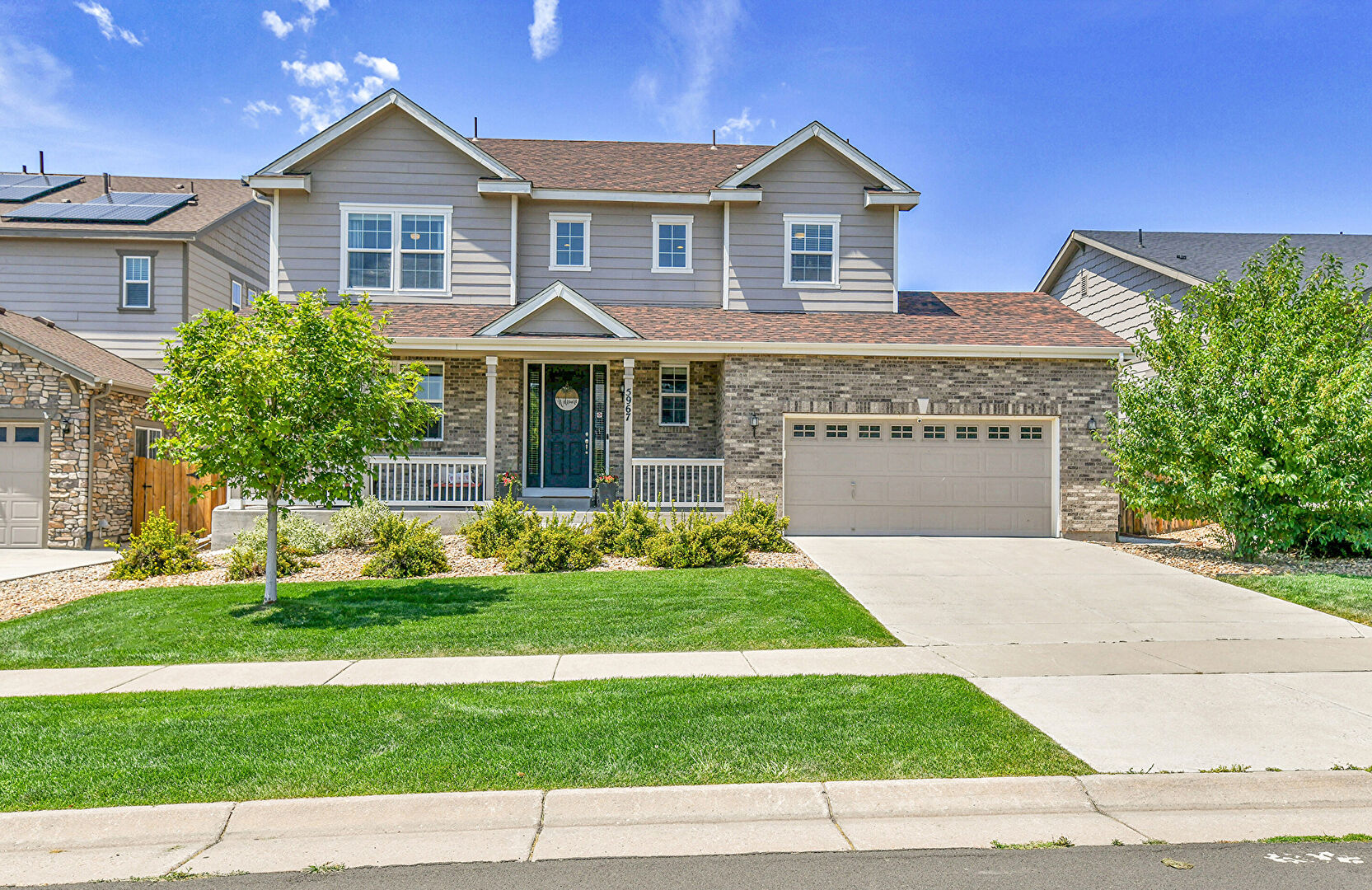 Front at 5967 South Langdale Court, Aurora, CO 80016, listed by Jayson Holland