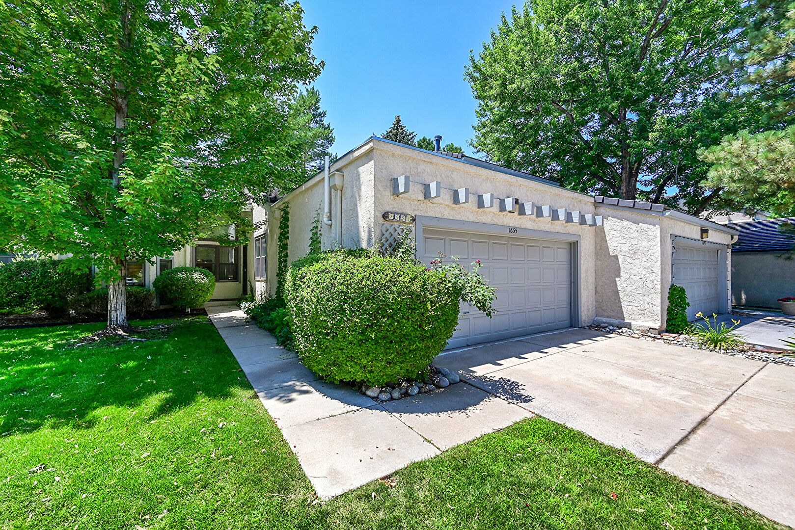 Front at 1655 South Syracuse Street, Denver, CO 80231, listed by Azam Aslamy