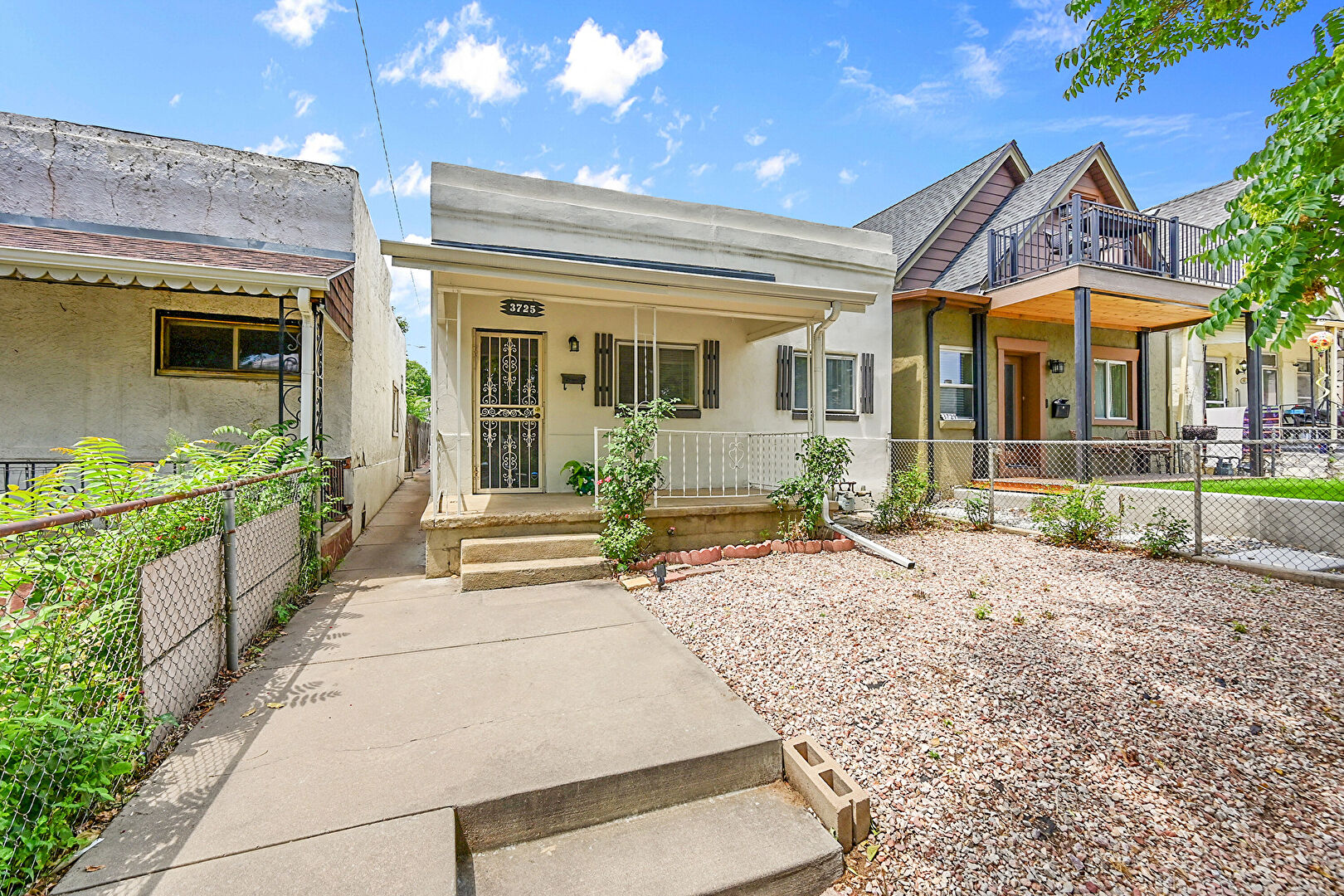 Front at 3725 Mariposa Street, Denver, CO 80211, listed by Sandy Schiel