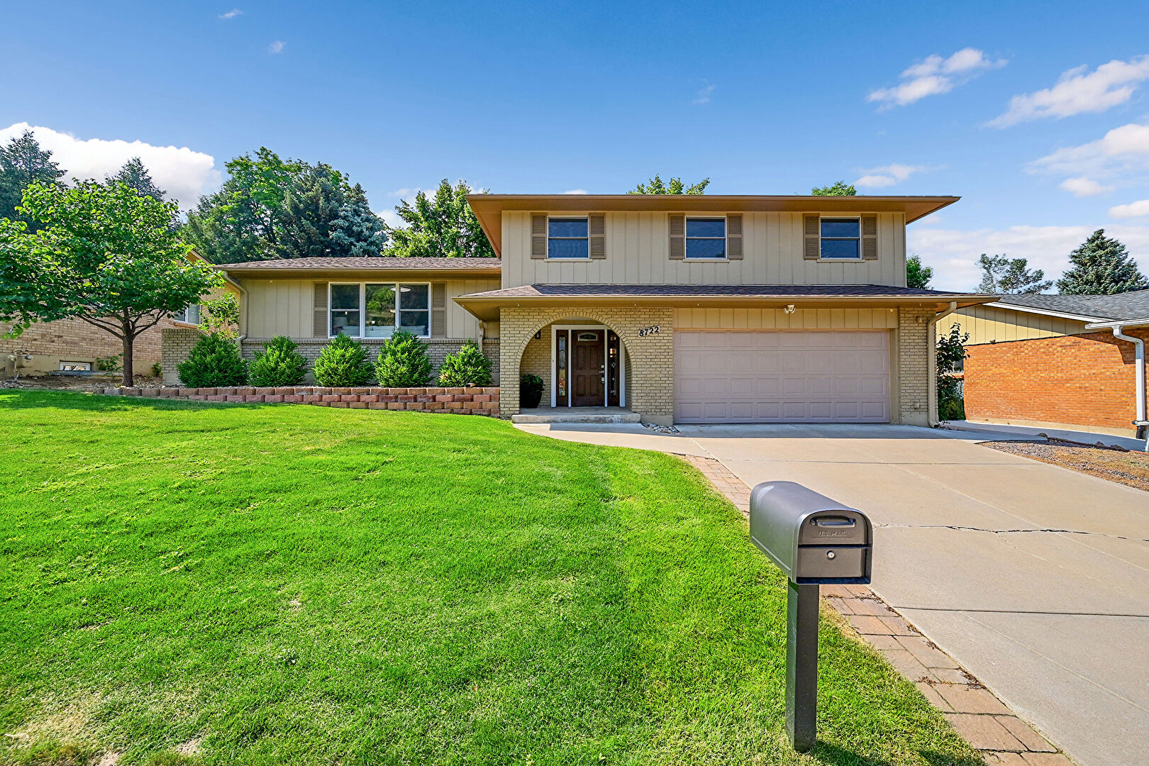 Front at 8722 E Layton Avenue, Denver, CO 80237, listed by Beth Smart