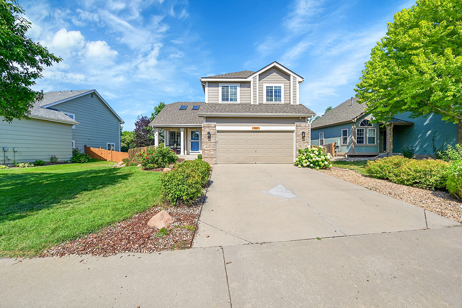 Front at 465 Mesa Drive, Loveland, CO 80537, listed by Philip Cooper