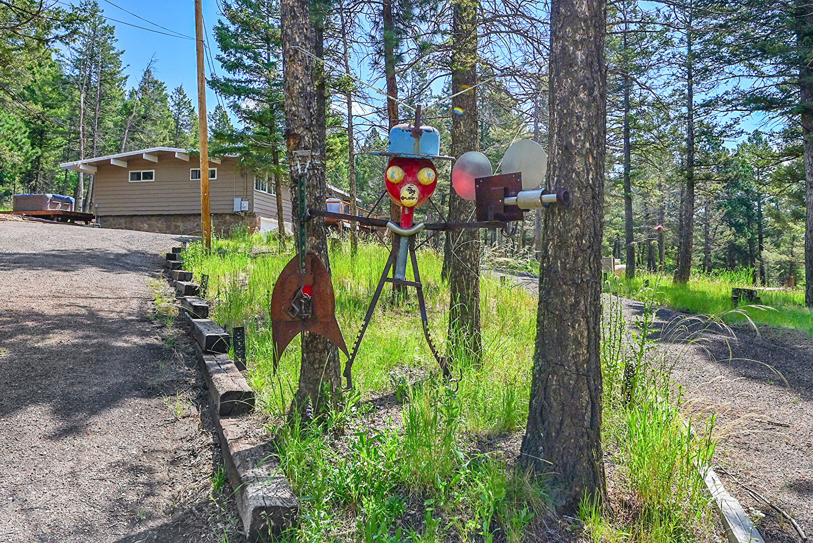 Driveway Entrance at 30723 Kings Valley Drive, Conifer, CO 80433, listed by Leigh Ann Jordan
