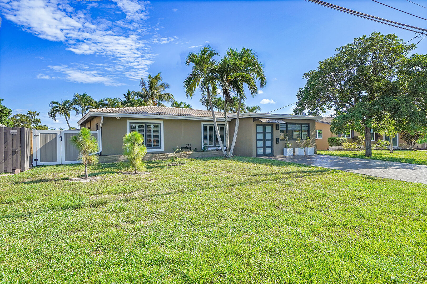 Front at 1736 Northwest 38th Street, Oakland Park, FL 33309, listed by Kenny Silverman, MLS ID: F10516376