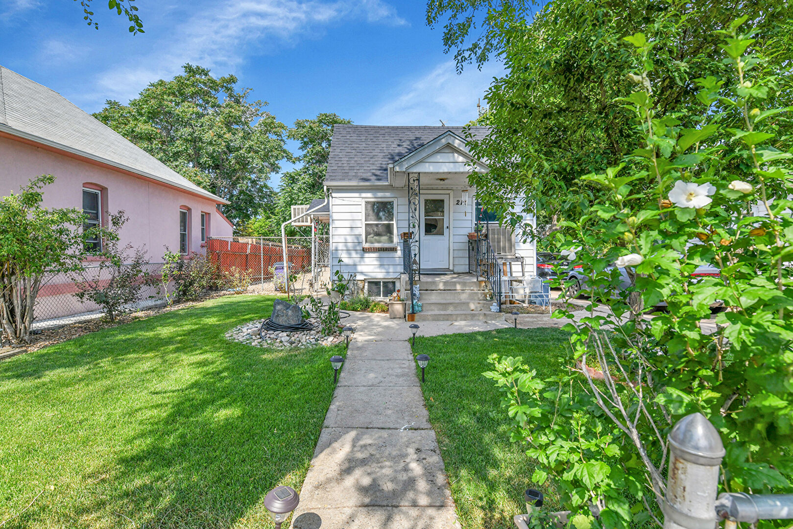 Front at 217 Irving Street, Denver, CO 80219, listed by Miguel Gonzalez