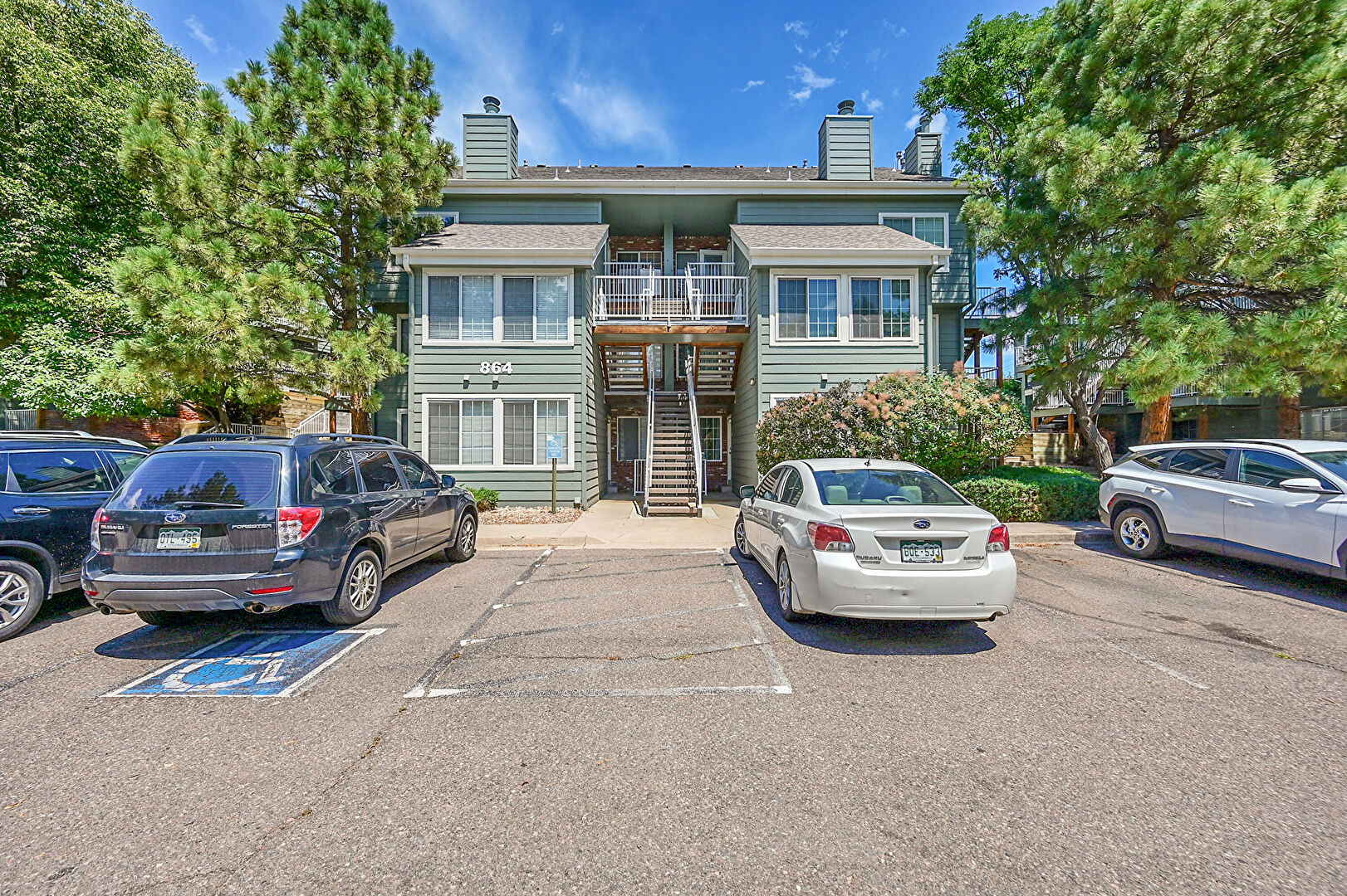Front at 864 South Reed Court, Unit G, Lakewood, CO 80226, listed by Katie Metzger