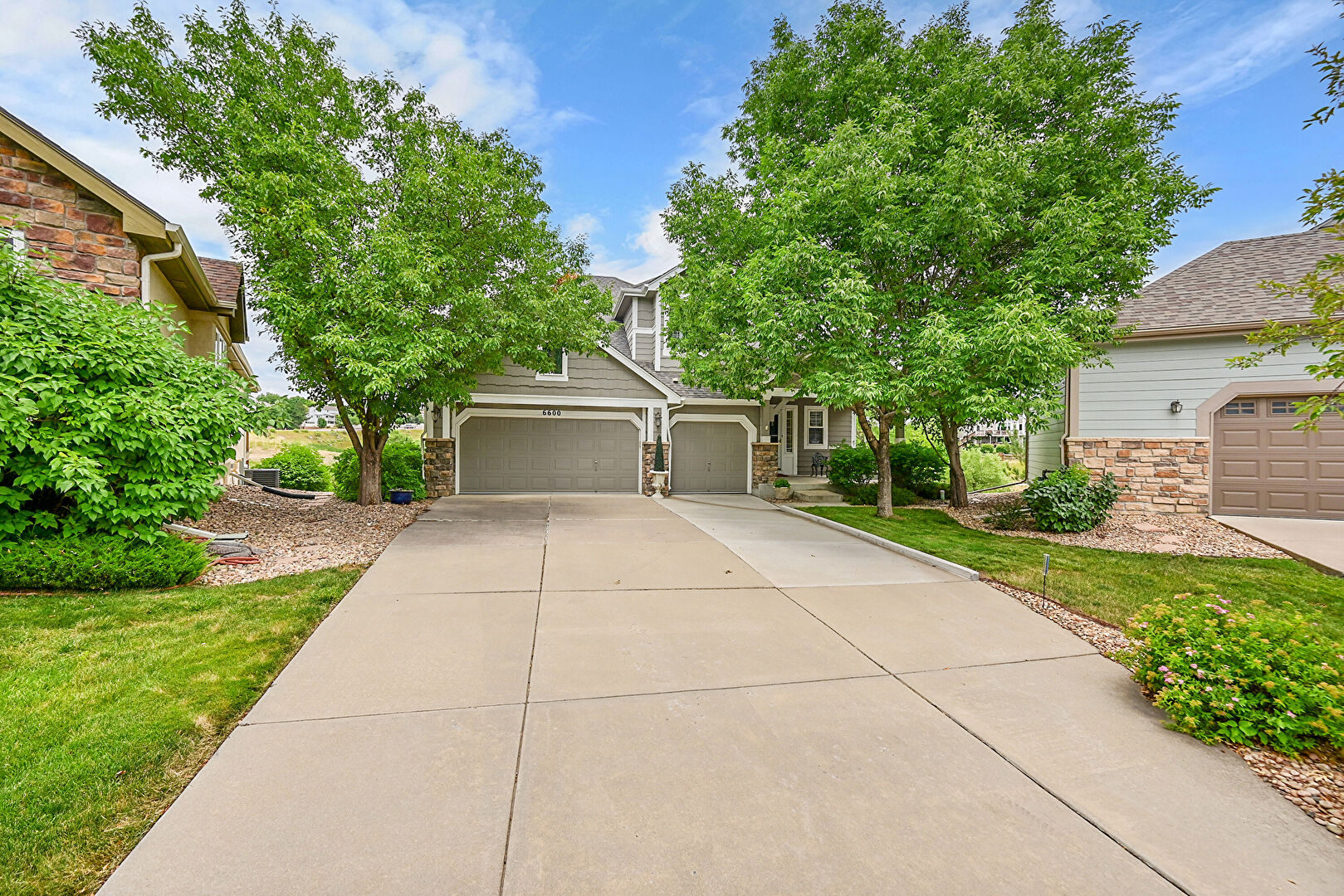 Front at 6600 S Robb Street, Littleton, CO 80127, listed by Greg Dach