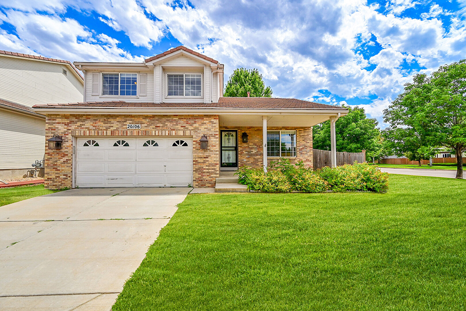 Front at 20106 East 41st Place, Denver, CO 80249, listed by Yonas Yirdaw