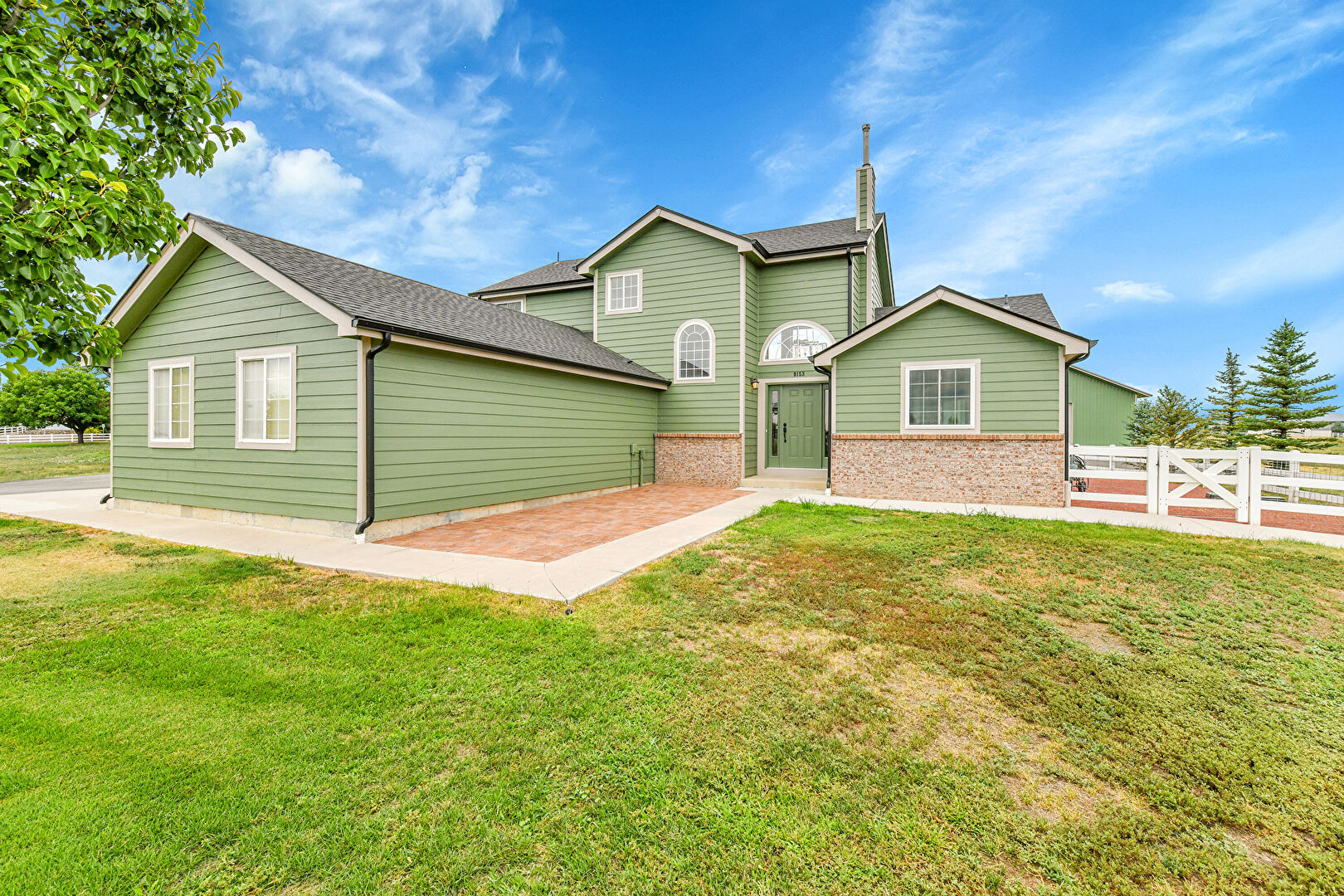 Front at 9153 East 155th Drive, Brighton, CO 80602, listed by Derek Rodriguez