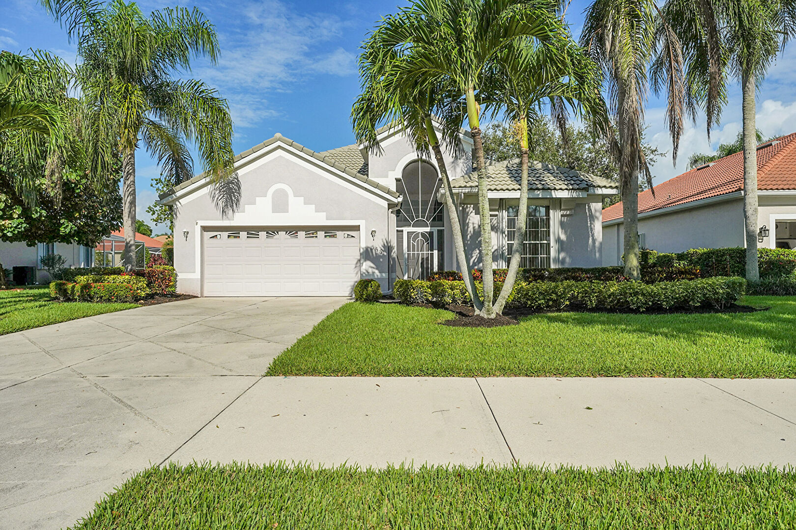 Front at 566 SW Lake Charles Circle, Port Saint Lucie, FL 34986, listed by Kelley Bragg, PA
