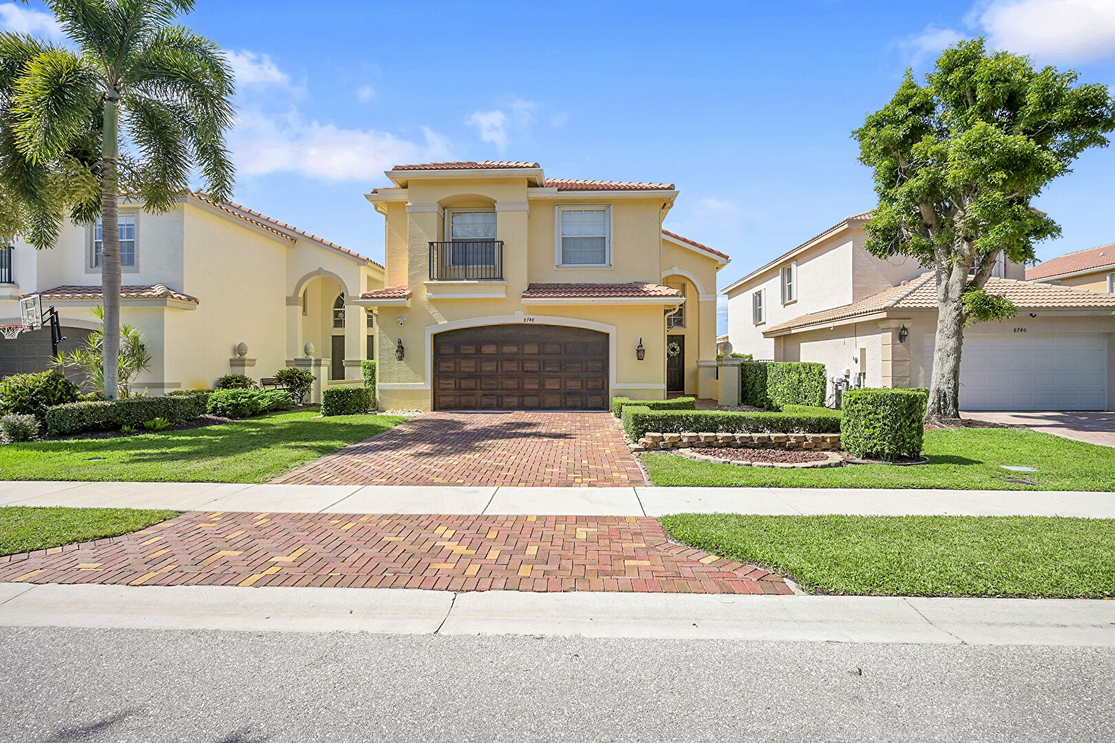 Front yard at 8748 Sandy Crest Lane, Boynton Beach, FL 33473, listed by Michael Cabot