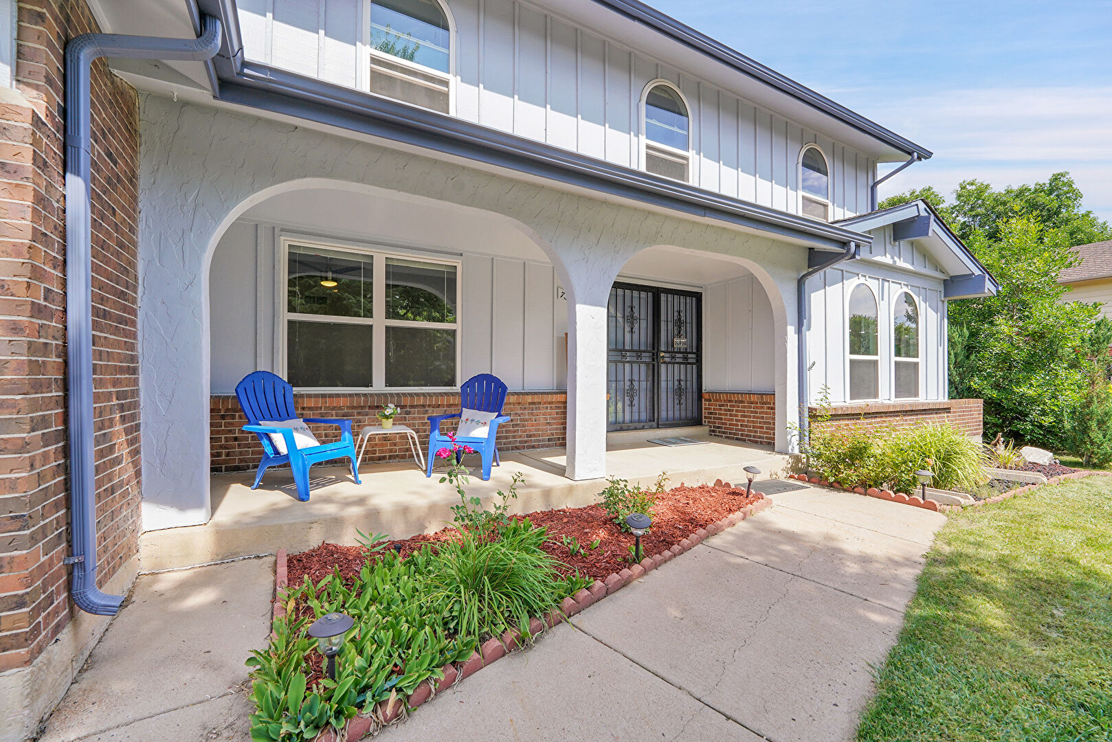 Front at 7303 East Mercer Place, Denver, CO 80237, listed by Matthew Lutz