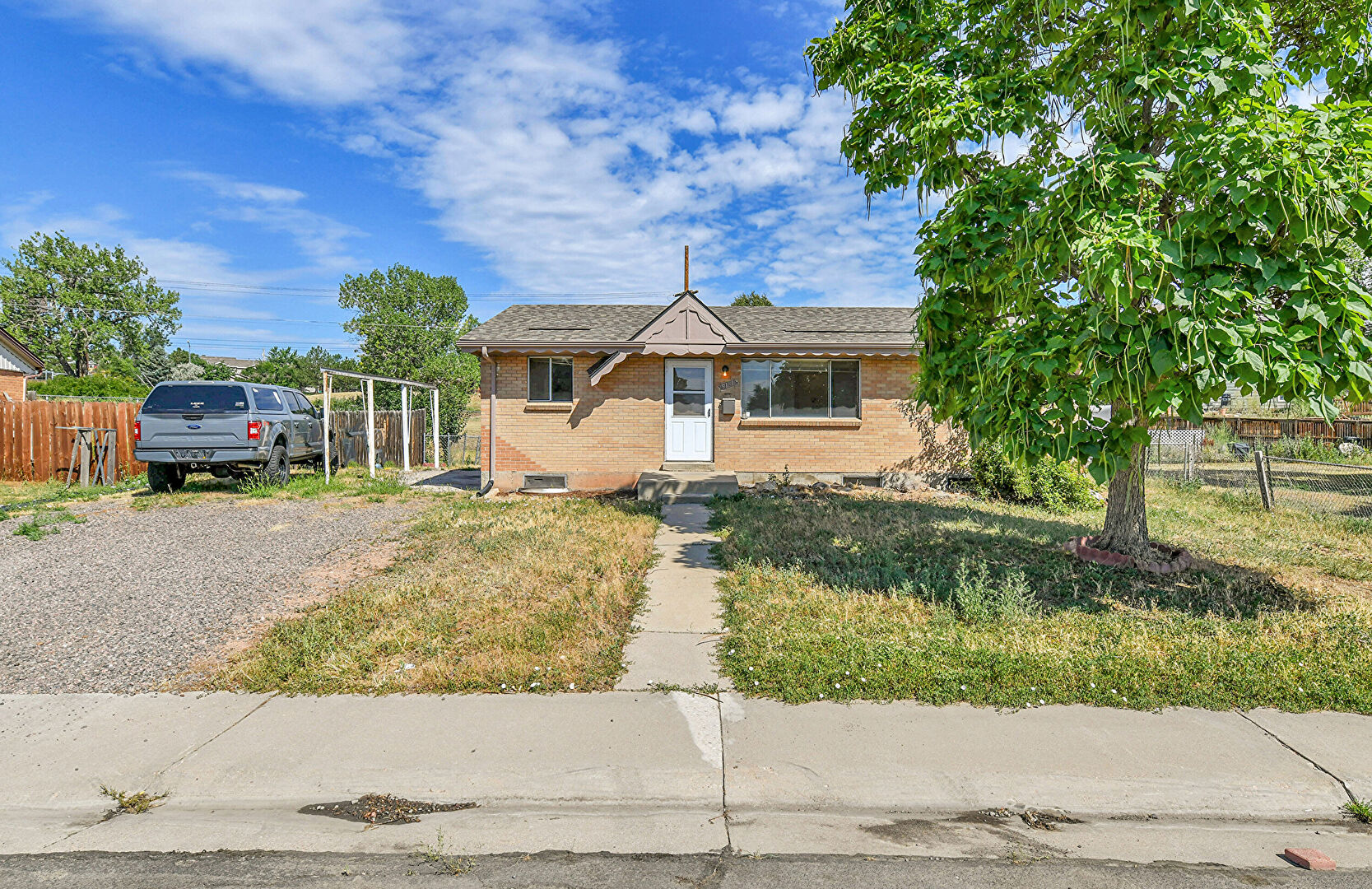 Front at 9181 Aspen Dr, Thornton, CO 80229, listed by Matthew Lutz