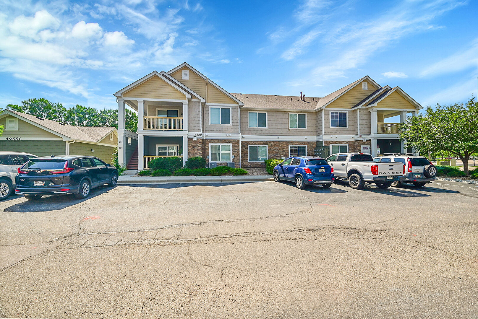 Front at 4955 Hahns Peak Drive, 102, Loveland, CO 80538, listed by Suzanne Ekeler