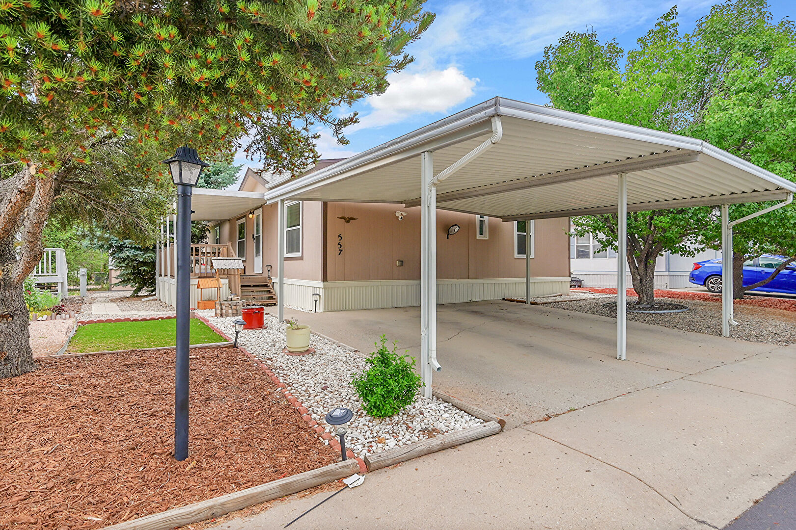 Front at 1095 Western Drive, Lot 557J, Colorado Springs, CO 80915, listed by Brittany Hamrick