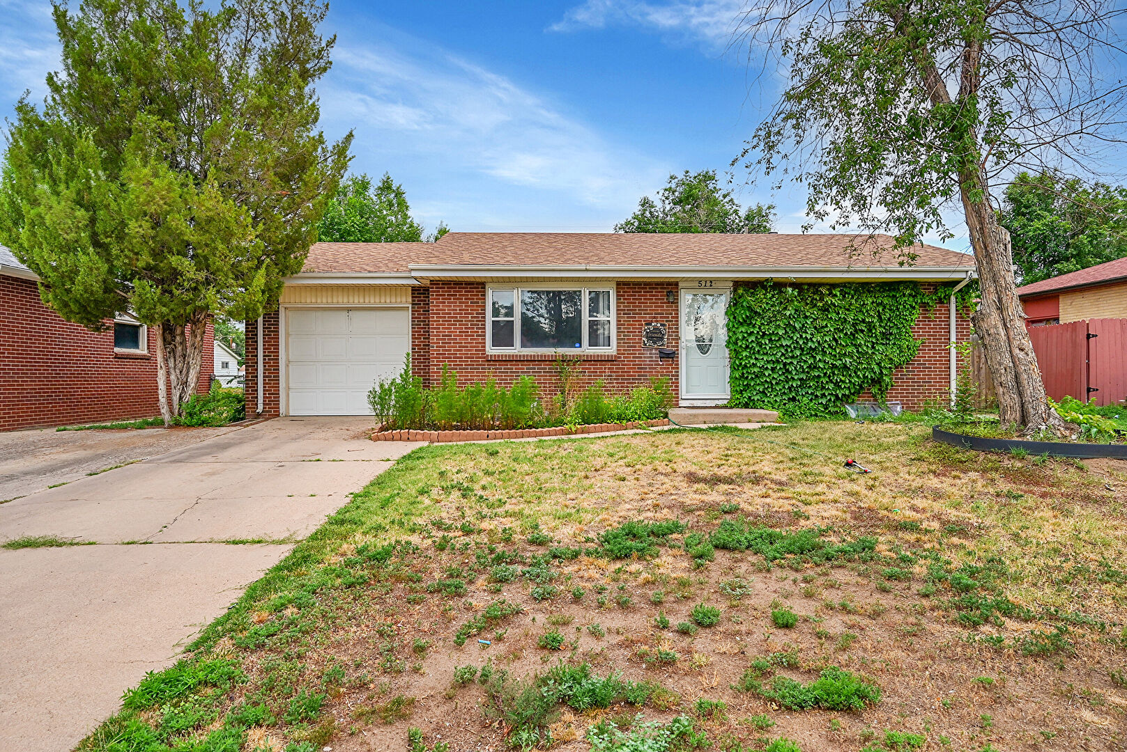 Front at 512 26th Avenue Court, Greeley, CO 80634, listed by Brad Inhulsen