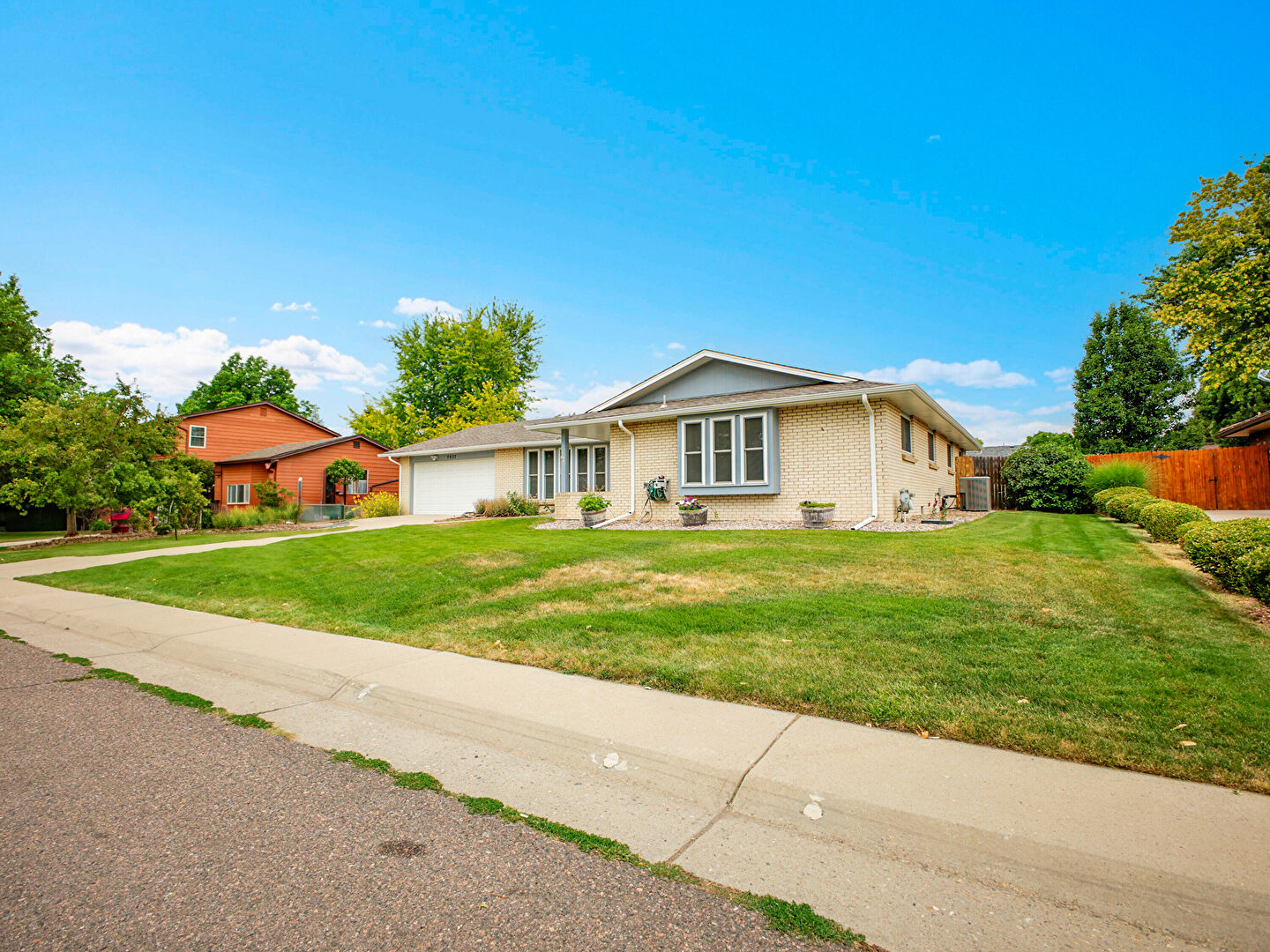 Front at 7037 South Newland Street, Littleton, CO 80128, listed by Amber Wermerskirchen