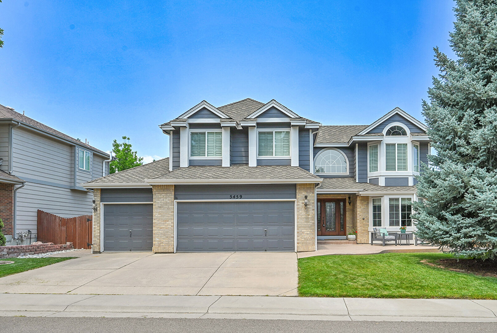Front at 5459 East Dry Creek Circle, Centennial, CO 80122, listed by Tatyana Sturm