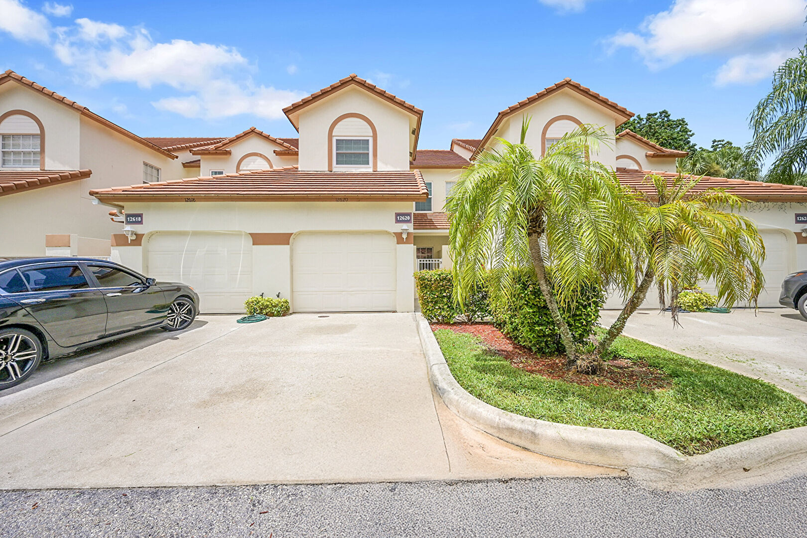 Front of Structure at 12620 Shoreline Dr, Wellington, FL 33414, listed by Lucia (Lucy) Escobar