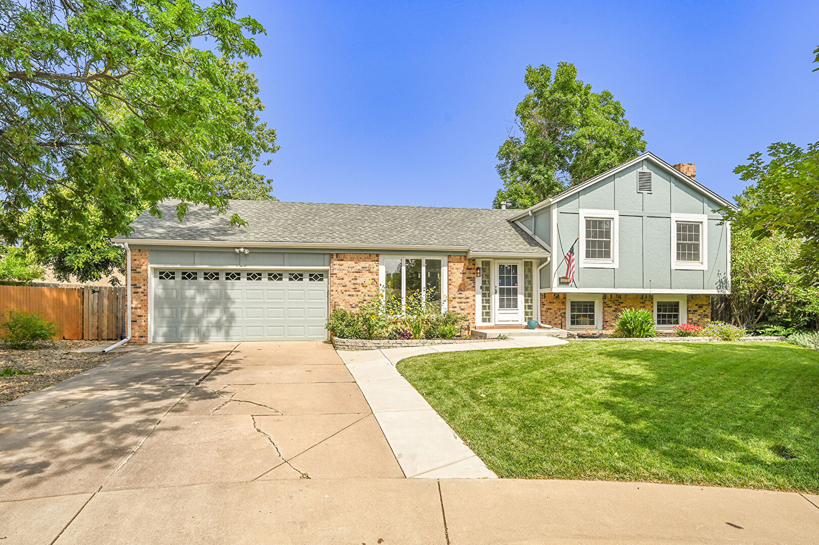 Front at 13915 East Alabama Place, Aurora, CO 80012, listed by Tatyana Sturm