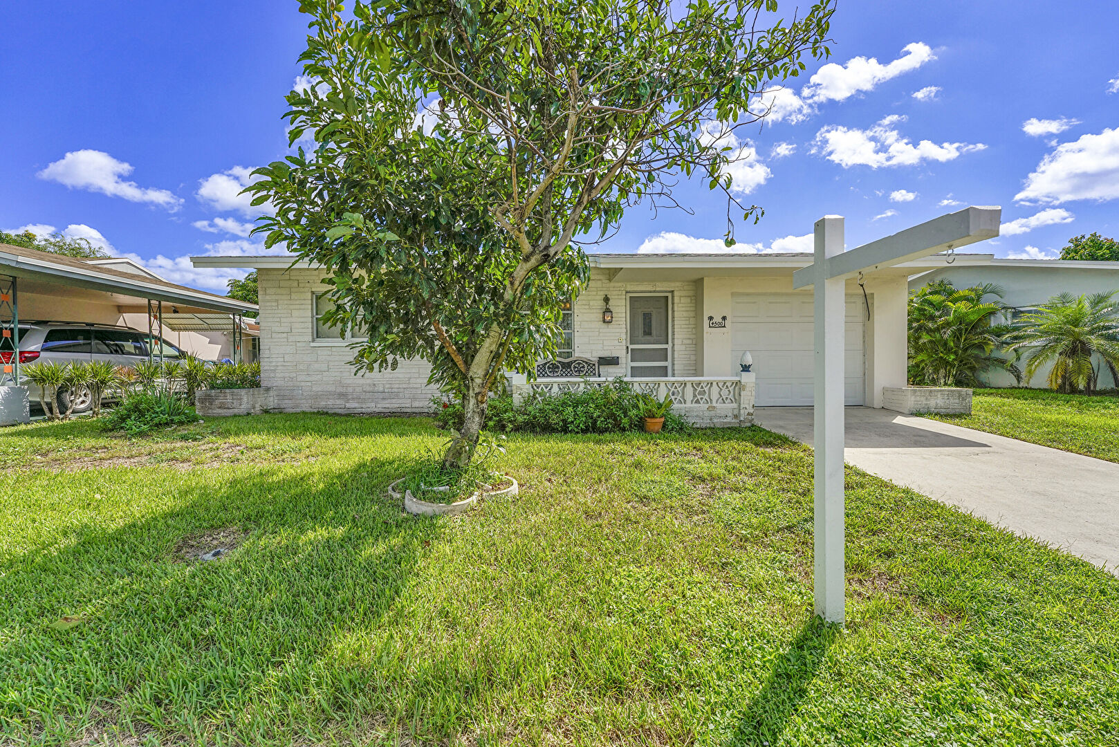 Front at 4500 Northwest 47th Court, Tamarac, FL 33319, listed by Eileen Mulkey