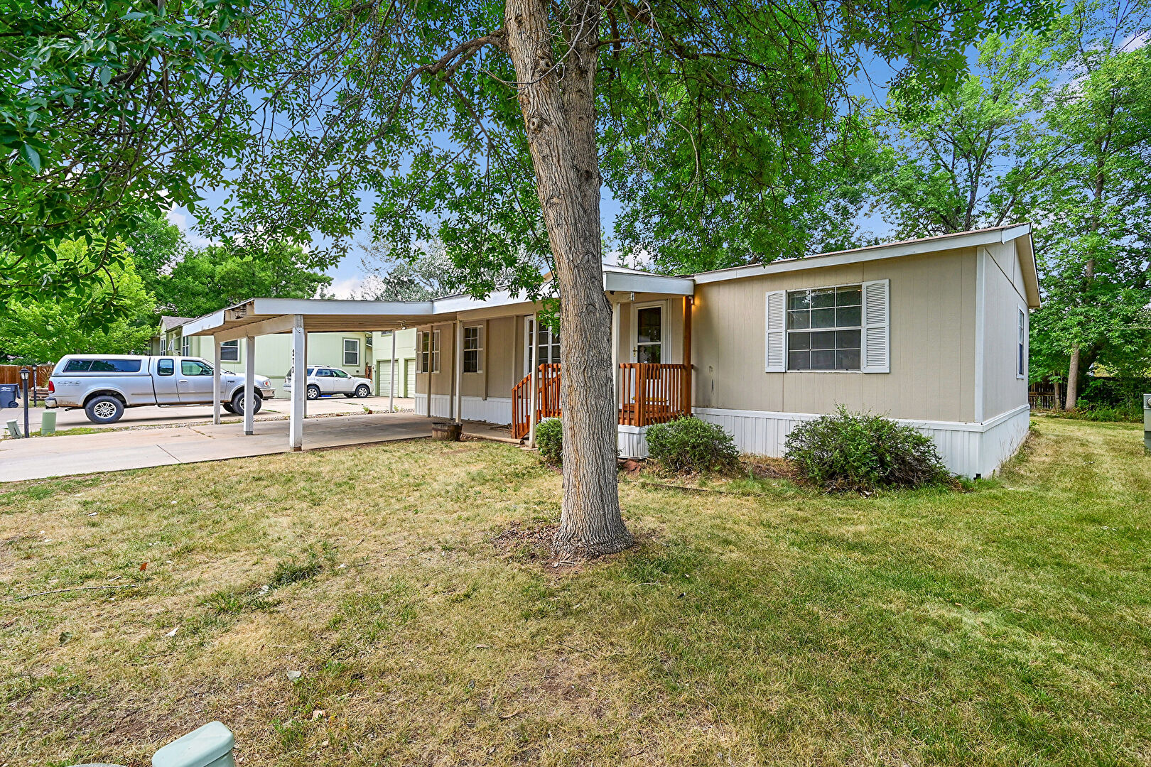 Front at 2211 West Mulberry Street Lot 273, Fort Collins, CO 80521, listed by Vanessa Carreon