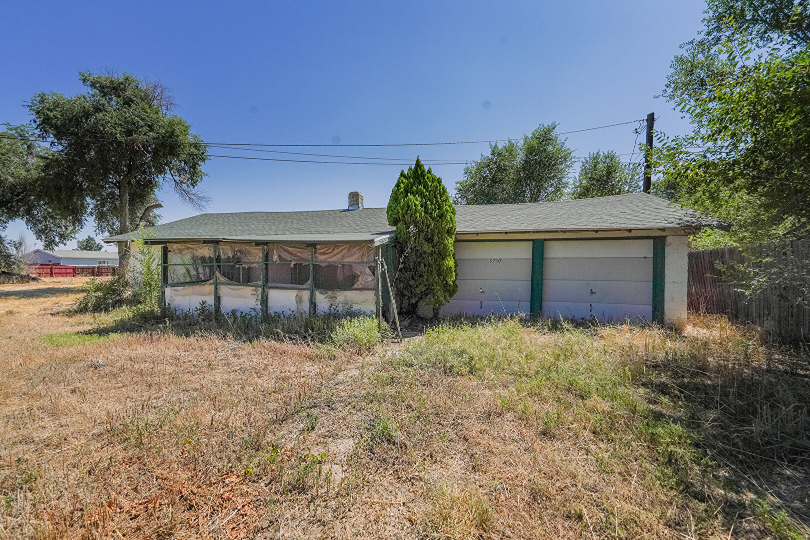 Garage at 8250 Jasmine Street, Dupont, CO 80024, listed by Patrick Morgan, MLS ID: 4666599