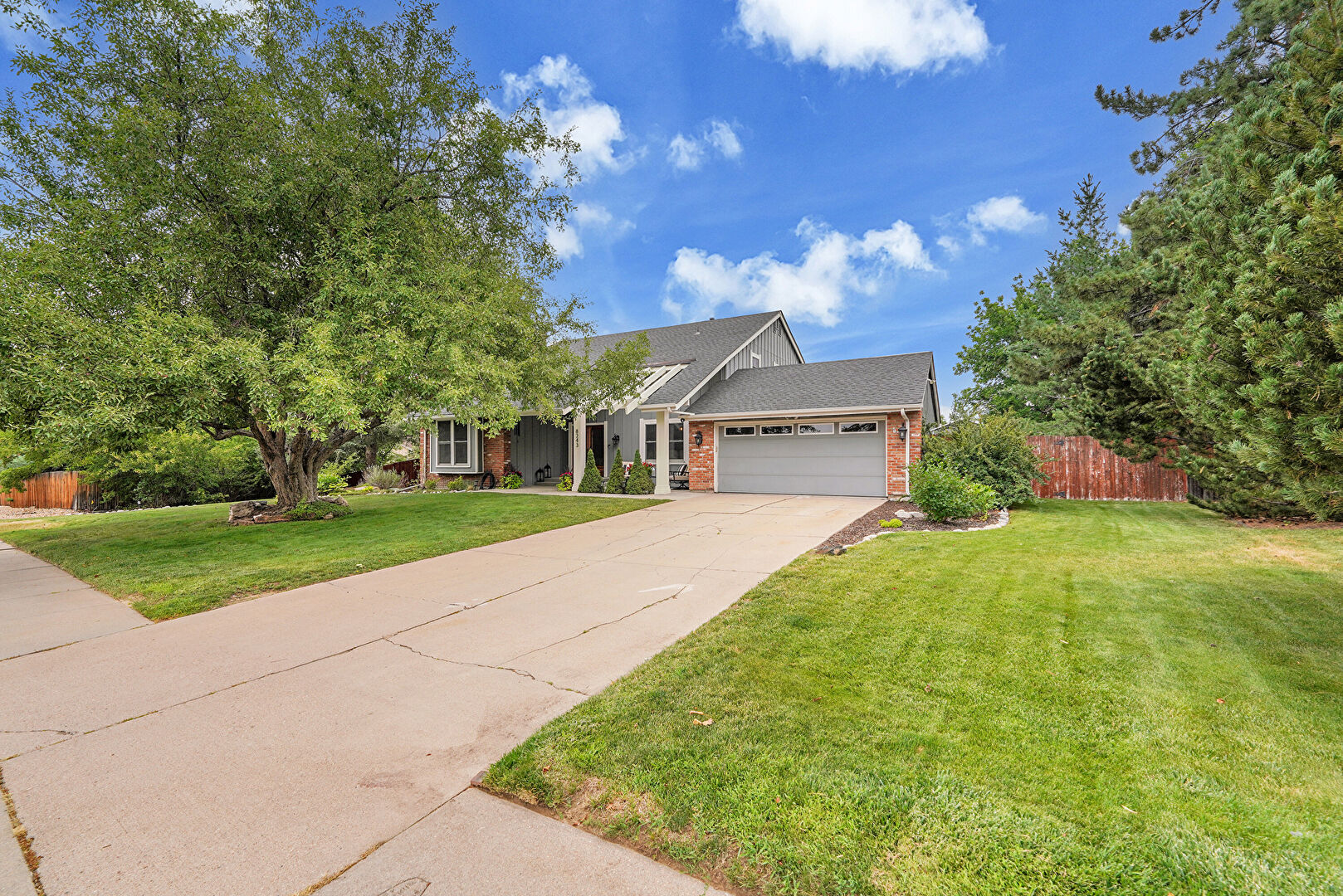 Front at 8243 East Mineral Drive, Centennial, CO 80112, listed by Jessica Whitney
