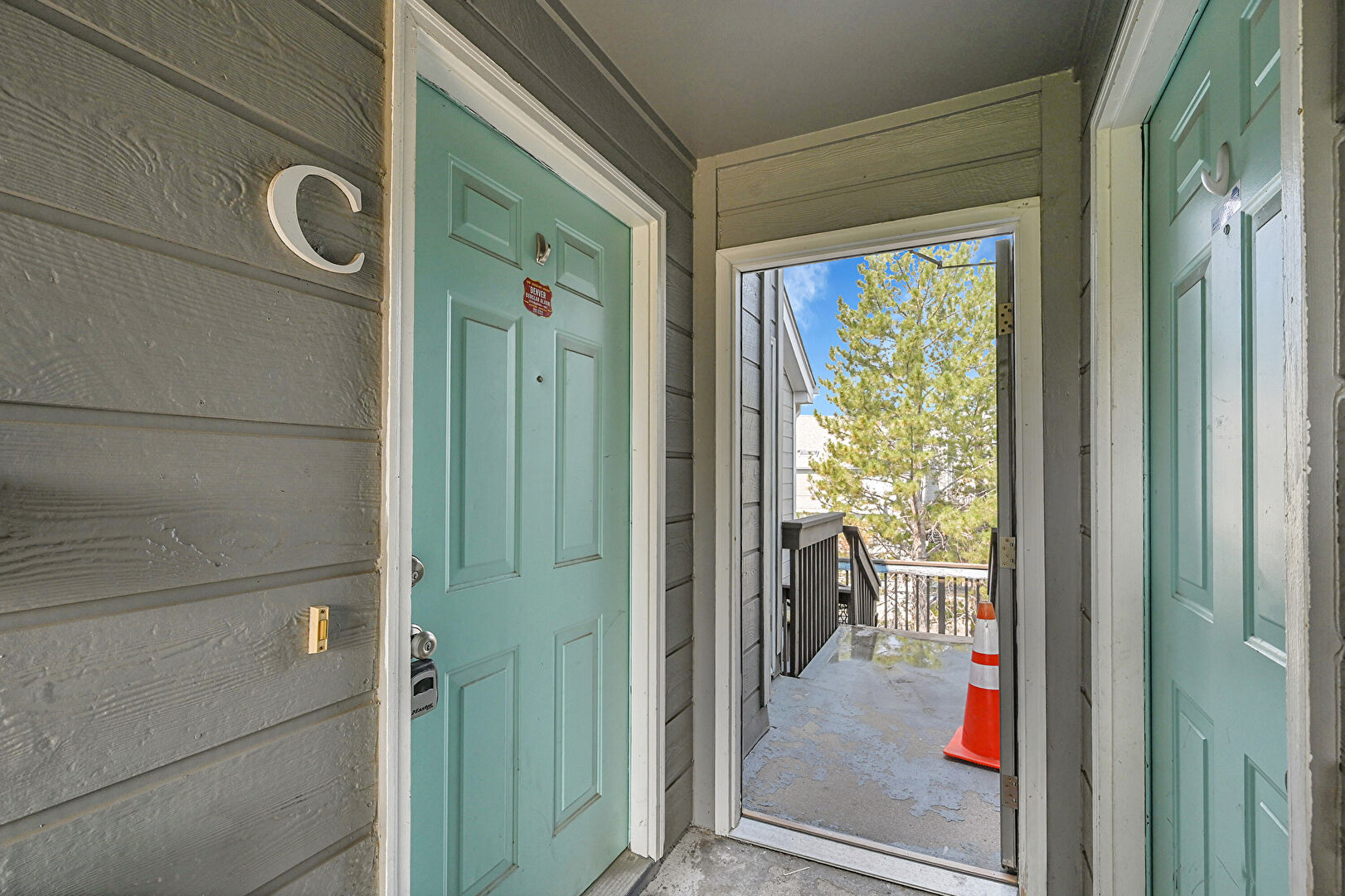 Entry at 12404 East Tennessee Circle, Unit C, Aurora, CO 80012, listed by Lorri Orihuela
