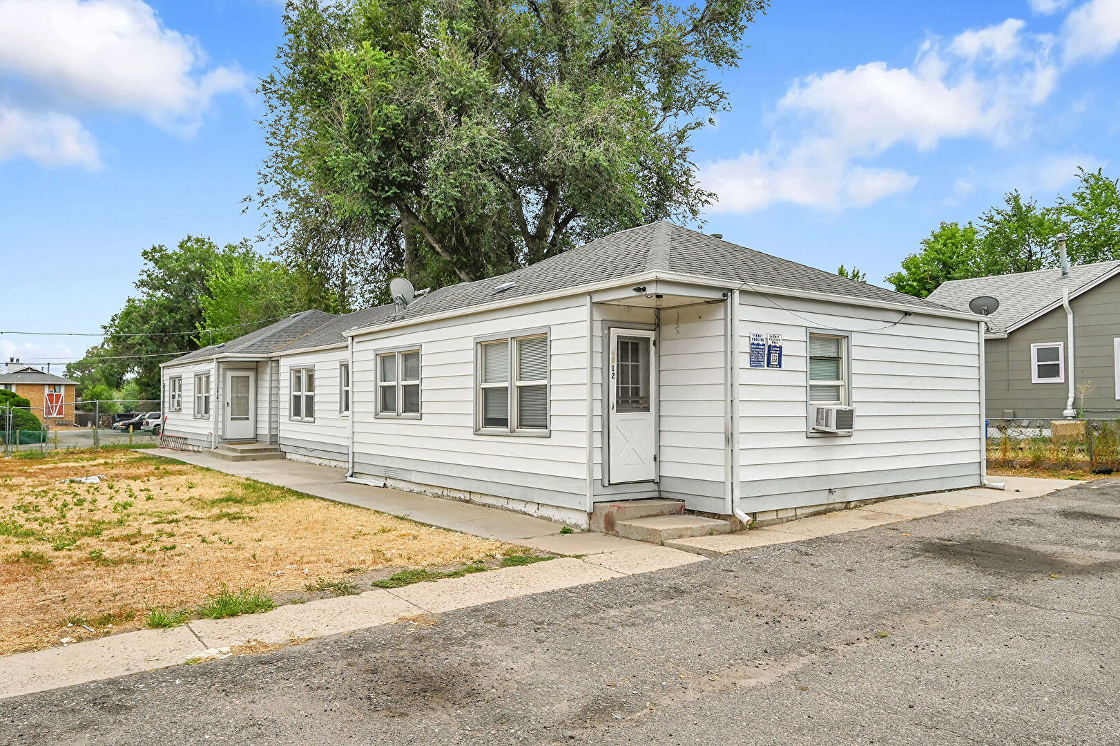 Front at 3614 South King Street, Denver, CO 80236, listed by Taylor Haas
