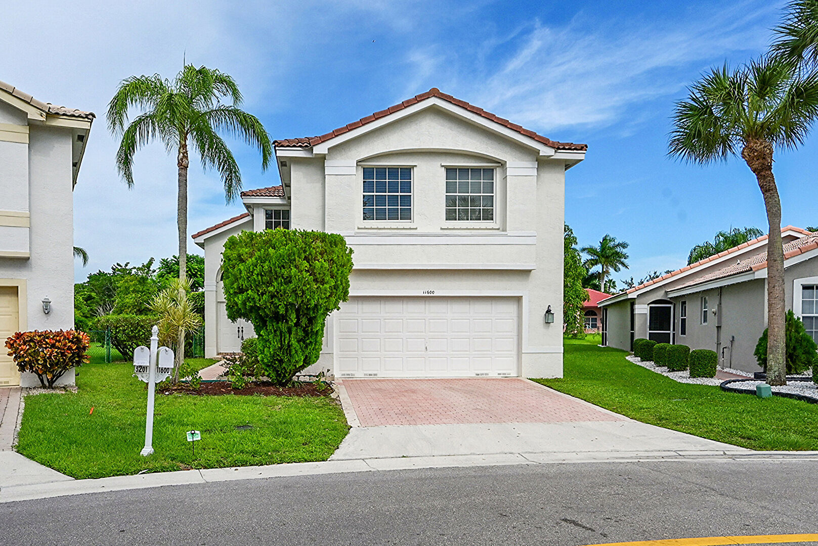 Front at 11600 Northwest 52nd Court, Coral Springs, FL 33076, listed by Laura Sanders, MLS ID: F10514761