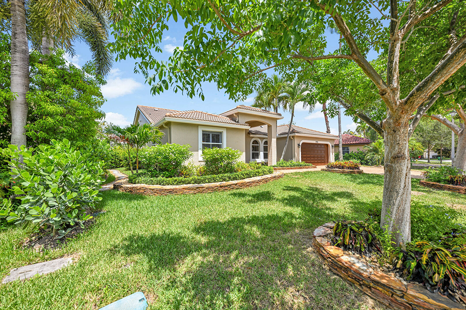 Front at 4910 Northwest 104th Avenue, Coral Springs, FL 33076, listed by Jeanette Cardoso, MLS ID: F10517474