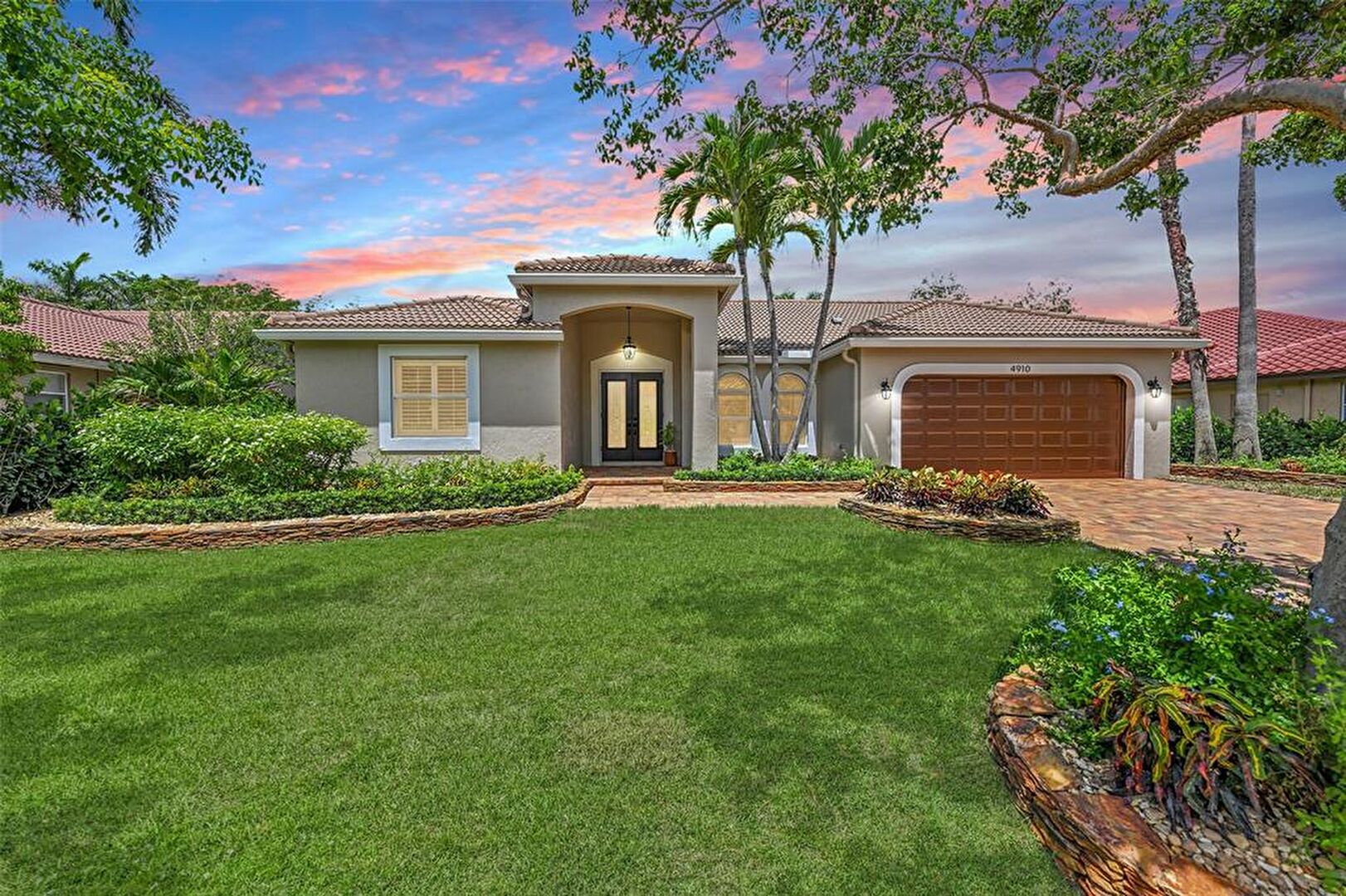 Front at 4910 NW 104th Ave, Coral Springs, FL 33076, listed by Jeanette Cardoso, MLS ID: F10517474